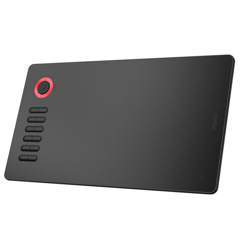 Czarny tablet graficzny z piórkiem na biurku