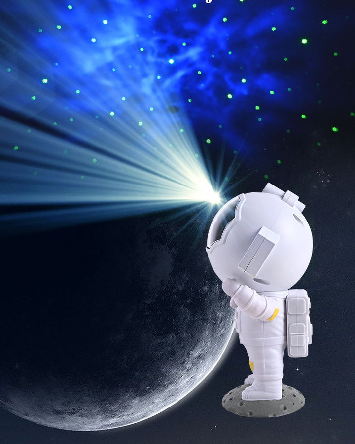 Projektor astronauta wyświetlający galaktykę