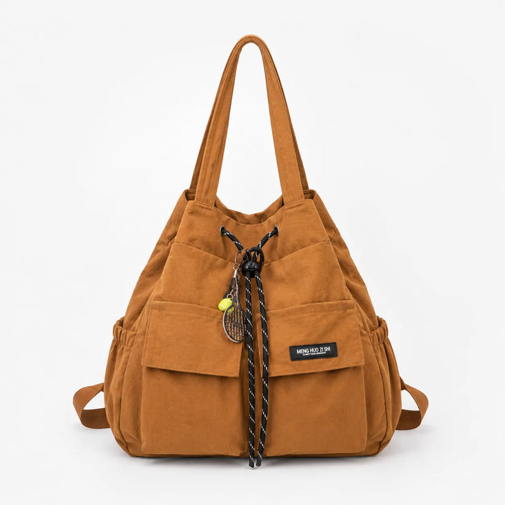 Torba Carryall – Konwertowalna torba z troczkami i plecak z kieszeniami cargo