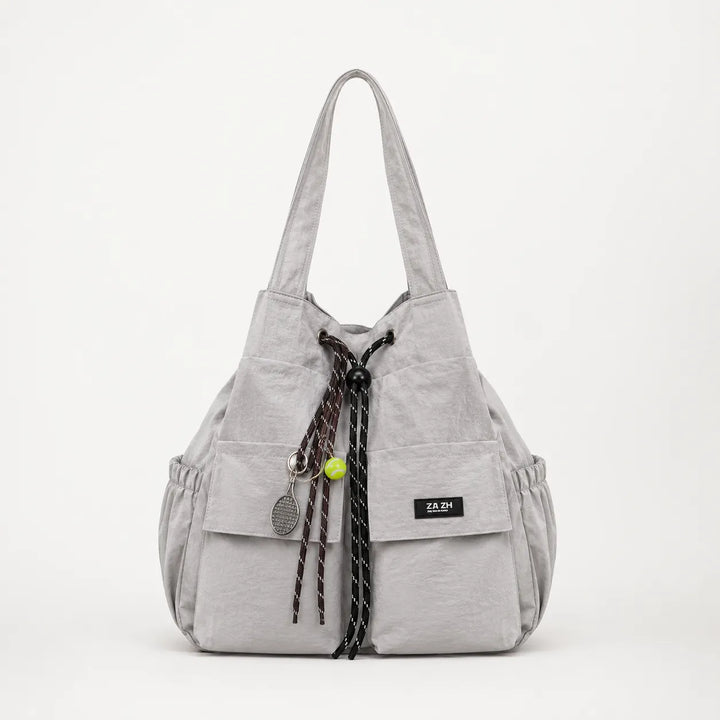 Torba Carryall – Konwertowalna torba z troczkami i plecak z kieszeniami cargo