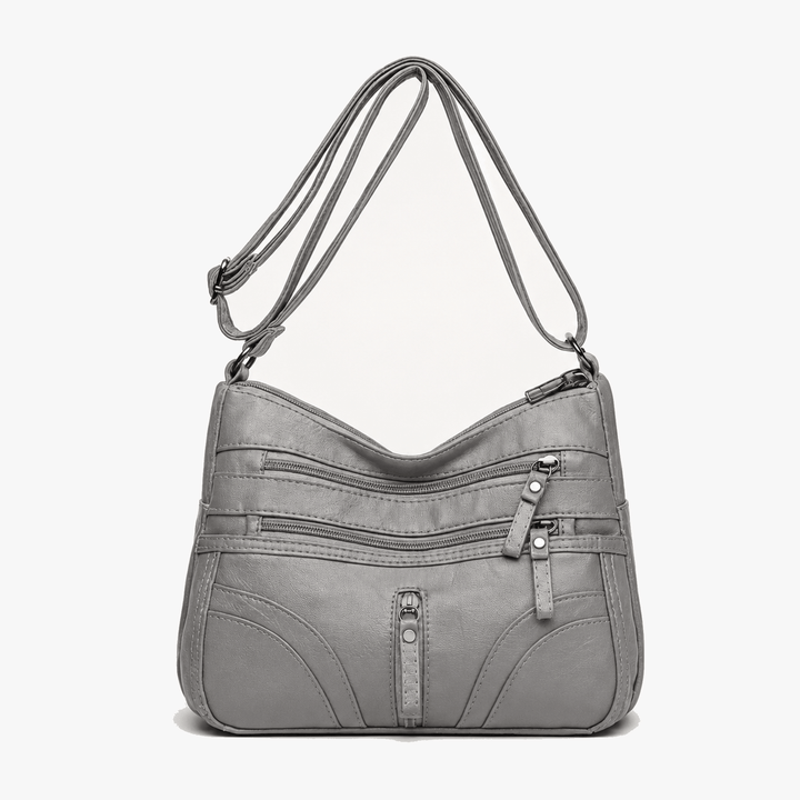 Caressa – Miękka skórzana torebka crossbody z wieloma kieszeniami