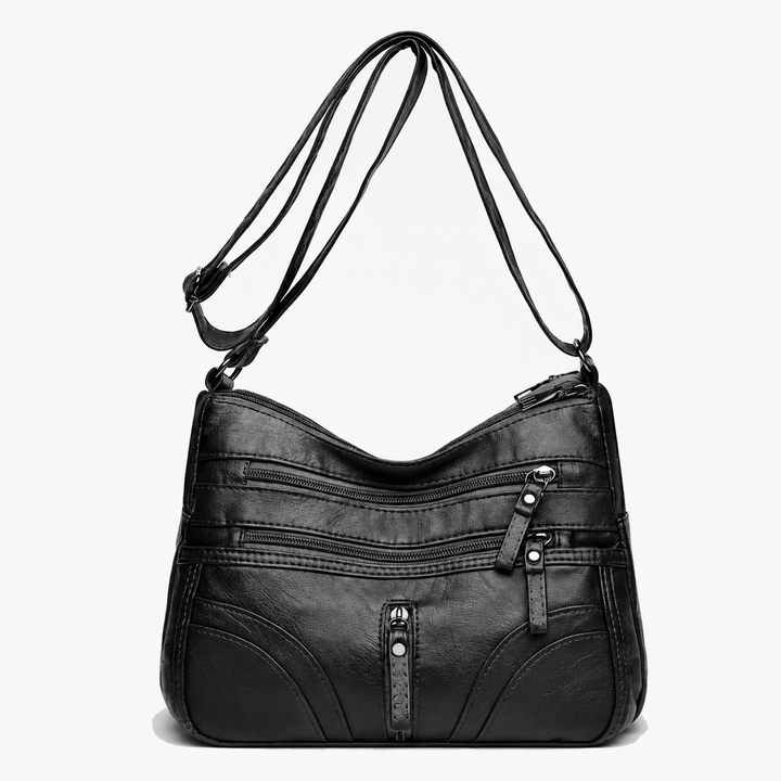 Caressa – Miękka skórzana torebka crossbody z wieloma kieszeniami