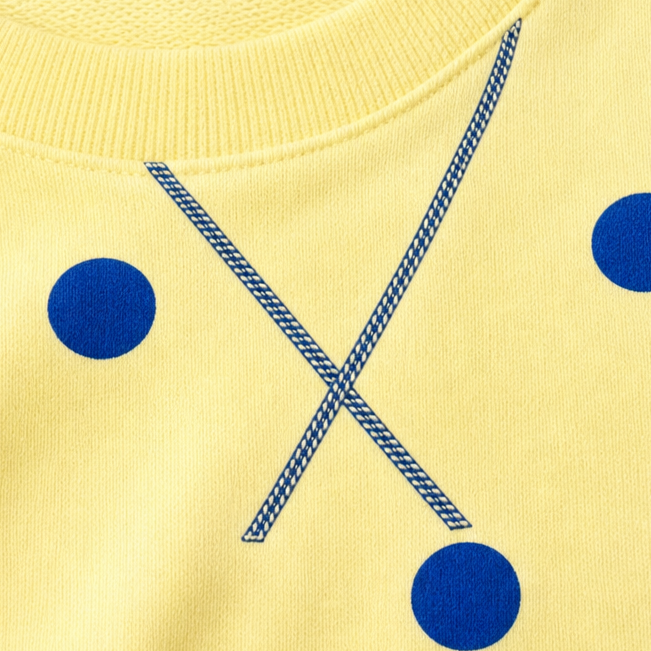 Sunbelle – Sweter z kropkami i wiązaniem na szyi