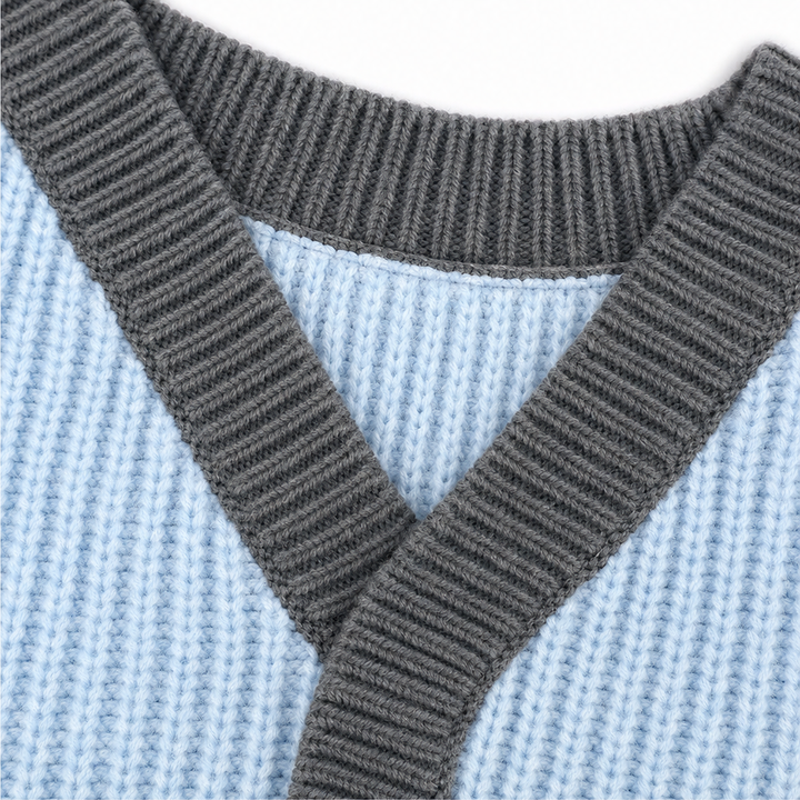 Vellora – Sweter z dekoltem w kształcie litery V z kontrastowymi wykończeniami i detalami guzików