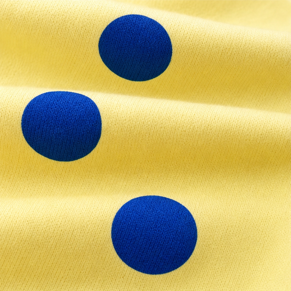 Sunbelle – Sweter z kropkami i wiązaniem na szyi