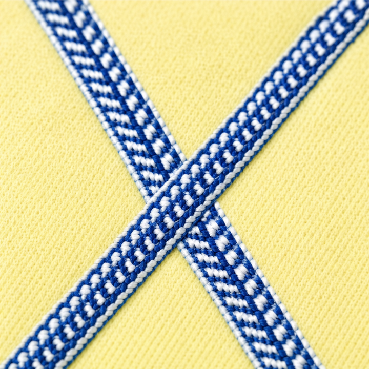 Sunbelle – Sweter z kropkami i wiązaniem na szyi