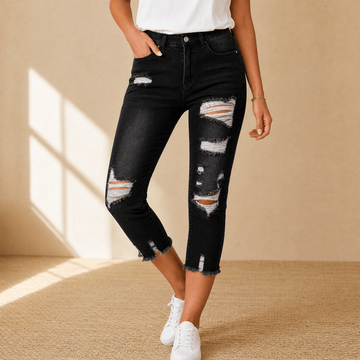 Delina – Damskie jeansy capri z miękkiej bawełny z postrzępionym dołem