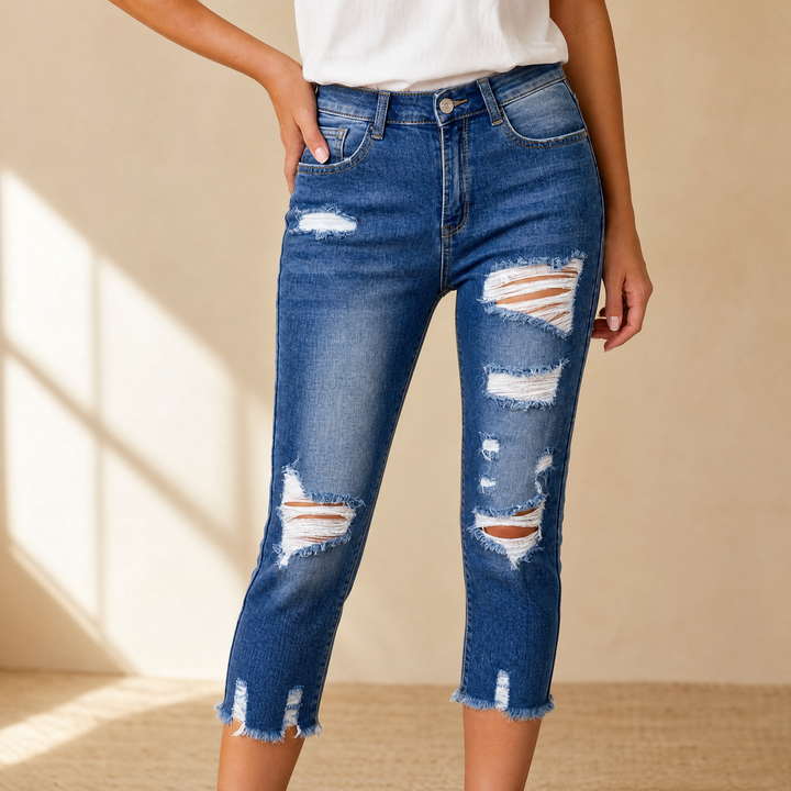 Delina – Damskie jeansy capri z miękkiej bawełny z postrzępionym dołem